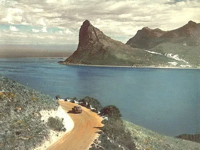 A vintage postcard of Chapman's Peak Drive winding above Hout Bay
