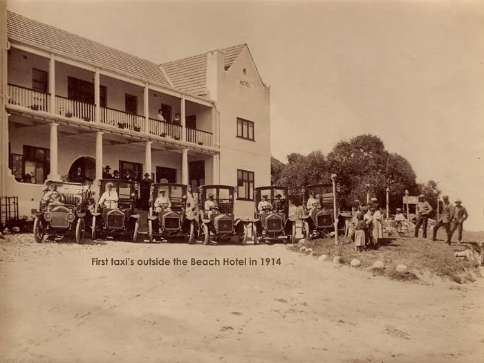 Early motor taxis lined up outside the Beach Hotel in 1914